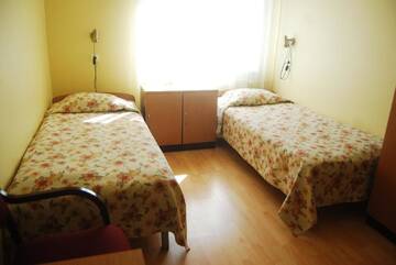 Фото номера Стандартный двухместный номер с 2 отдельными кроватями Отель Mardi Hotel г. Курессааре 5