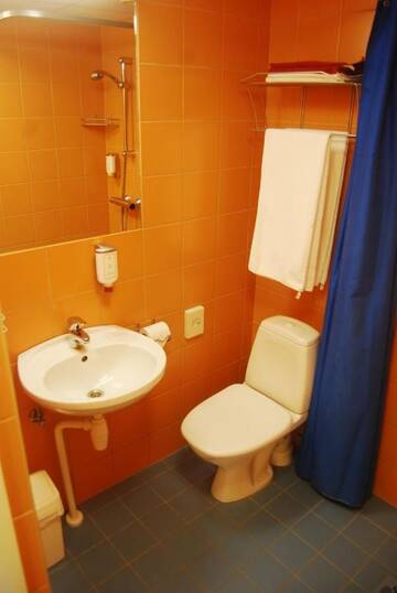 Фото номера Стандартный двухместный номер с 2 отдельными кроватями Отель Mardi Hotel г. Курессааре 4