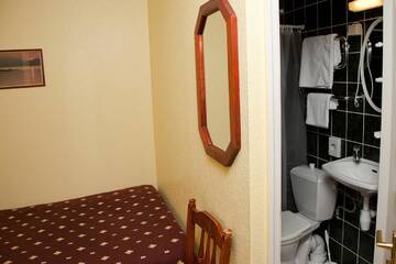 Фото номера Стандартный одноместный номер Отель Repo Hotel г. Курессааре 4