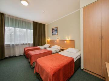 Фото номера Трехместный номер Отель Arabella Hotel г. Курессааре 2