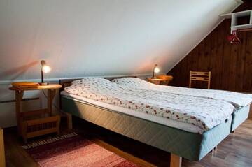 Фото номера Двухместный номер с 2 отдельными кроватями Гостевой дом Pärna Guesthouse &amp; Apartments г. Курессааре 14