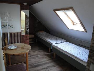 Фото номера Двухместный номер с 2 отдельными кроватями Гостевой дом Pärna Guesthouse &amp; Apartments г. Курессааре 6
