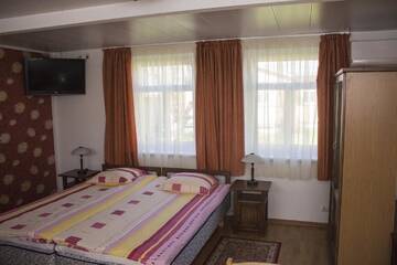 Фото номера Семейный номер-студио с видом на сад Гостевой дом Pärna Guesthouse &amp; Apartments г. Курессааре 10