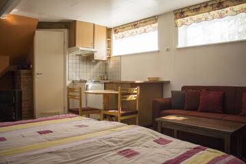 Фото номера Семейный номер-студио с видом на сад Гостевой дом Pärna Guesthouse &amp; Apartments г. Курессааре 11