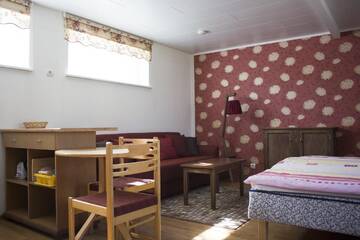 Фото номера Семейный номер-студио с видом на сад Гостевой дом Pärna Guesthouse &amp; Apartments г. Курессааре 12